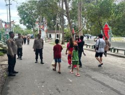 Anggota Polsek Bukit Batu Beri Rasa Aman di Area Objek Wisata City Forest Nyaru Menteng