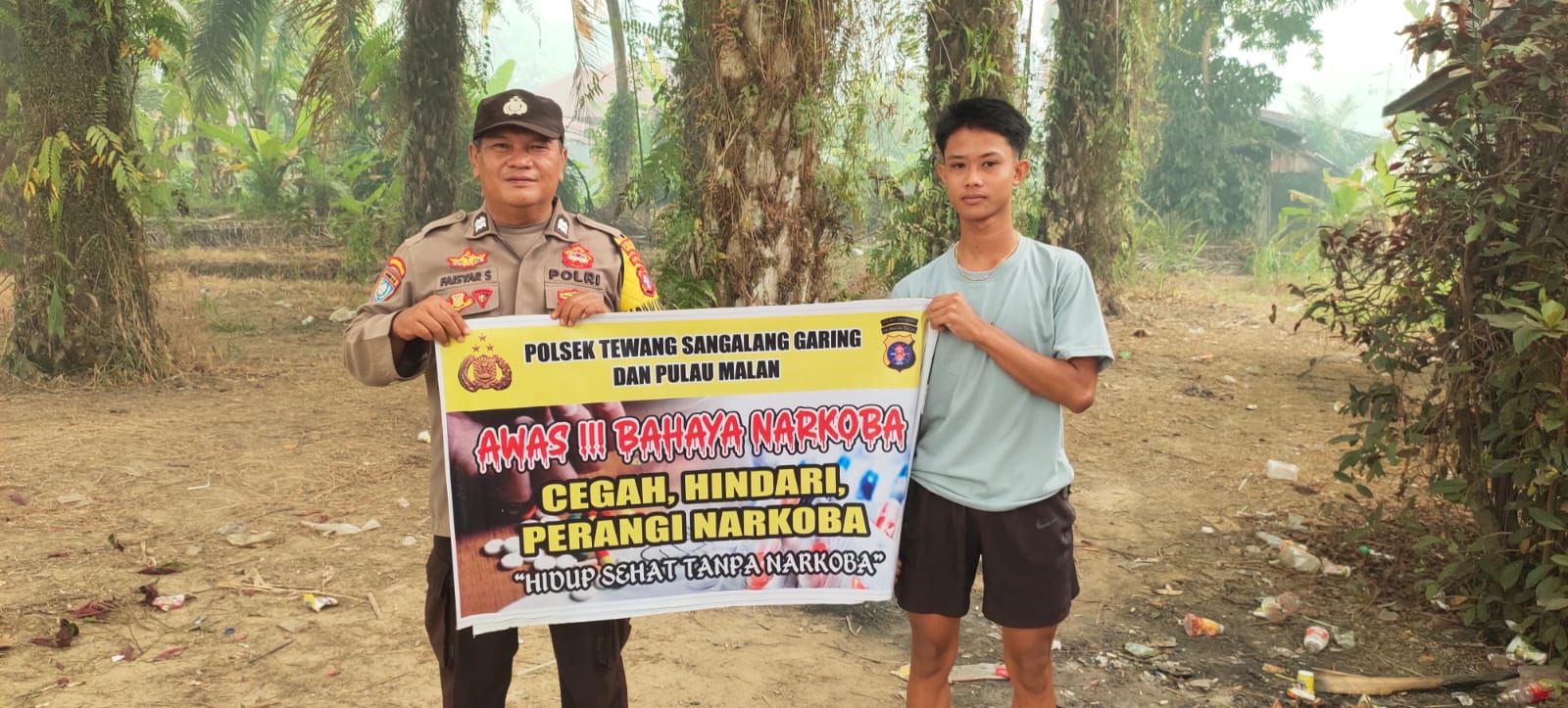 Melalui Media Spanduk, Polsek Tewang Sangalang Garing dan Pulau Malan Imbau Warga Tidak Terjerumus Penyalahgunaan Narkoba.